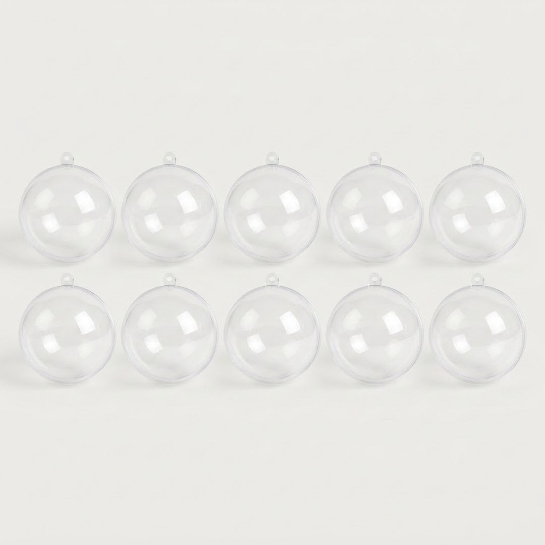 Ten clear plastic fillable ornaments with hanging loops form two rows of five across a white background.