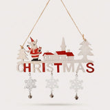 Red and white wooden Christmas ornament spelling CHRISTMAS, with a Santa figure, village houses and three dangling snowflakes with bells, on a light background