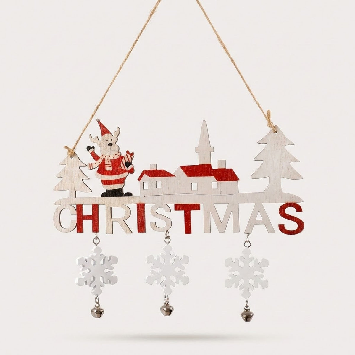 Red and white wooden Christmas ornament spelling CHRISTMAS, with a Santa figure, village houses and three dangling snowflakes with bells, on a light background