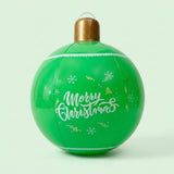 Green inflatable Christmas ornament with white Merry Christmas lettering, snowflakes, gold details, and a gold cap against a pale green background.