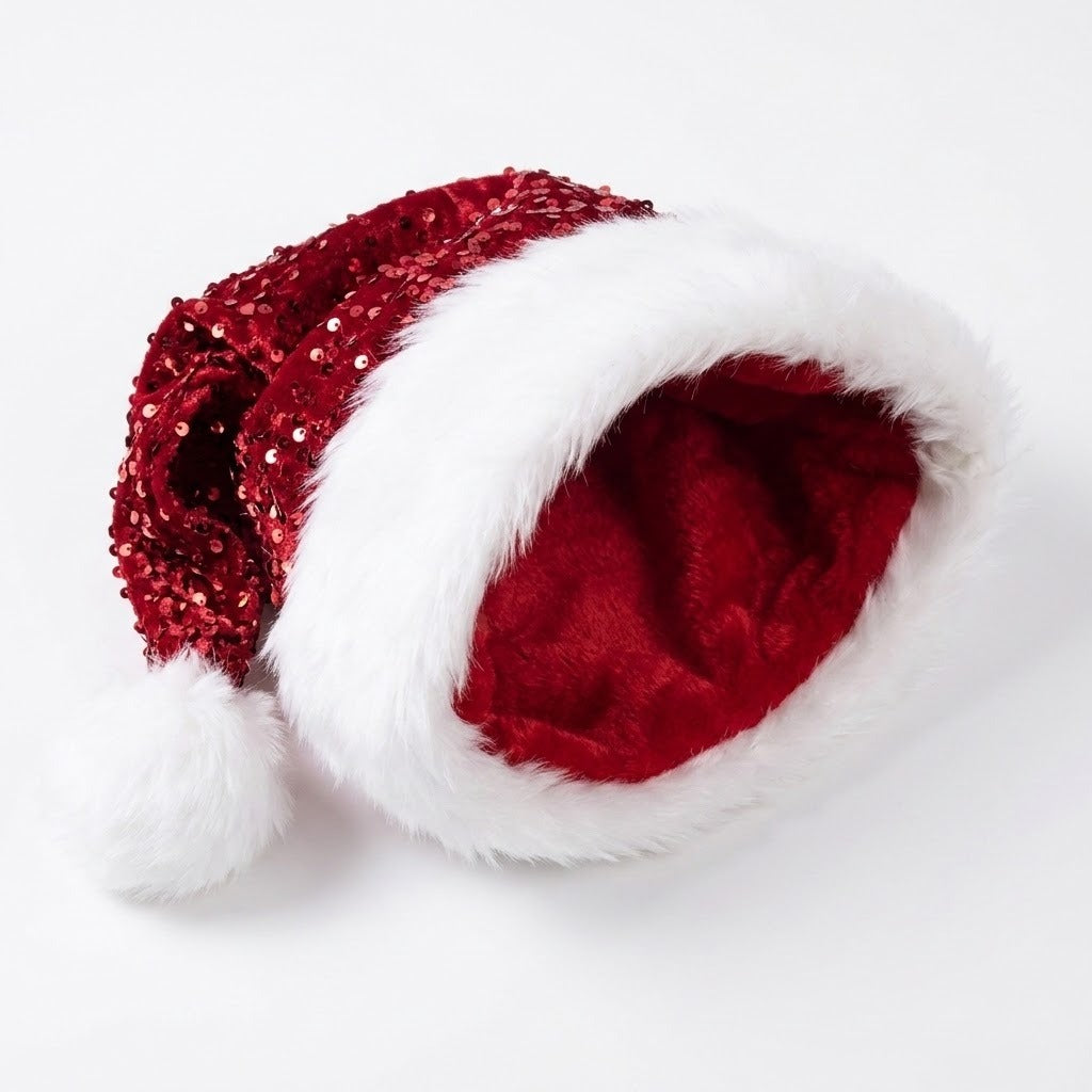 A festive Santa hat with a red sequined crown, white faux fur trim, and a white pom-pom, displayed on a clean white background.