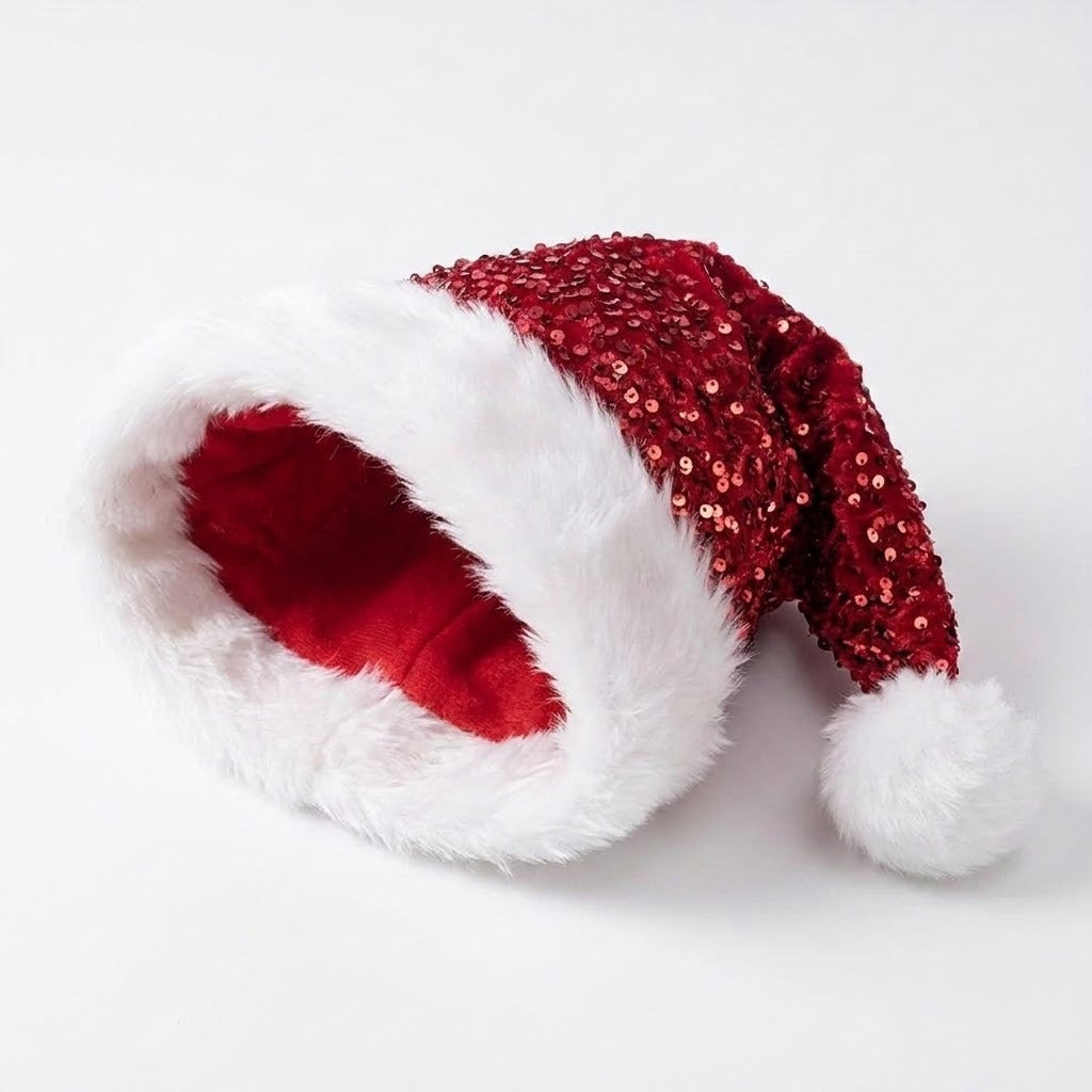 A festive Santa hat pet bed featuring a red sequined body, white faux fur trim, and a white pom-pom, photographed on a clean white background.