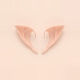 Light peach latex elf costume ears with curved hooks lying side by side on a pale peach background, 3.94 in (10 cm) pair.