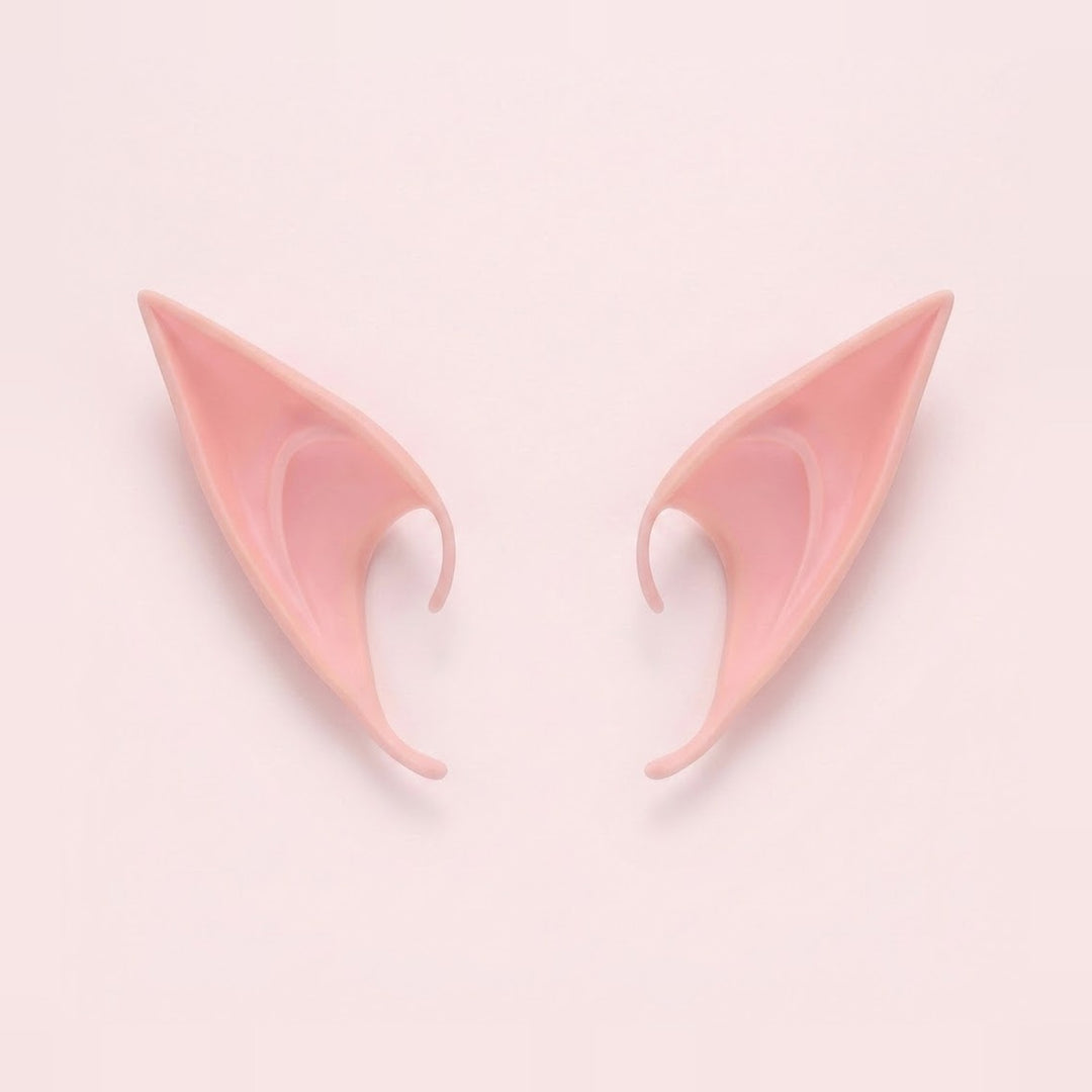 Pink latex elf costume ears with curved hooks lying side by side on a pale pink background, 4.72 in (12 cm) pair.