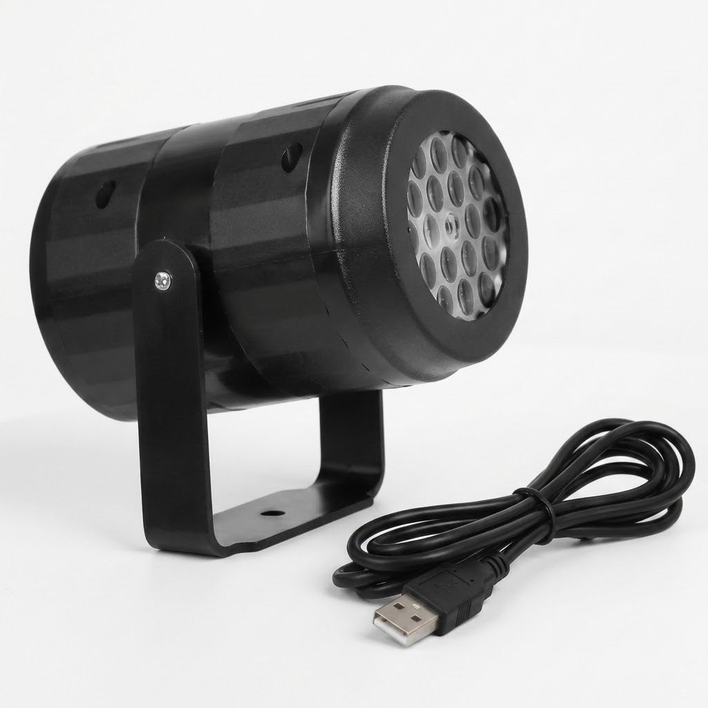 A black snowflake projector faces right on its U-shaped stand with a coiled USB cable in front against a white background.