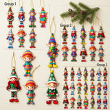 Colorful wooden elf Christmas ornaments with gold strings appear on a cream background in arrangements labeled Group 1, Group 2 and Group 3.
