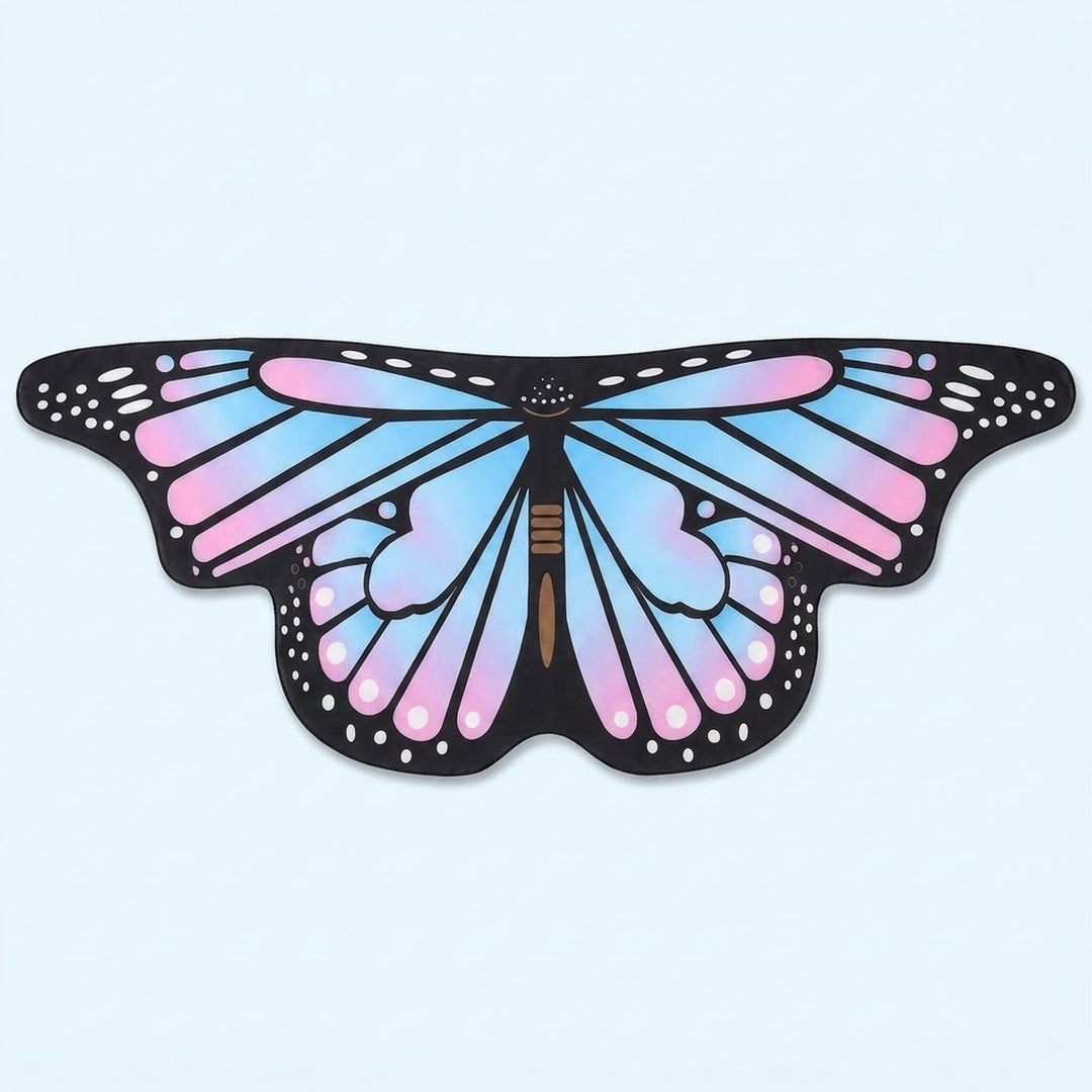 Pastel blue and pink butterfly wing cape with black veined wings and white spots, laid flat on a light blue background.