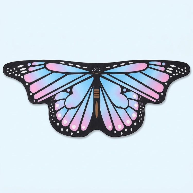 Pastel blue and pink butterfly wing cape with black veined wings and white spots, laid flat on a light blue background.