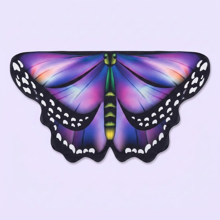 Purple and blue butterfly wing cape with soft pink highlights, black spotted borders, and a green body, on a lilac background.