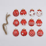 Twelve wooden Christmas ornaments feature red and white snowflakes, stars, trees, and stripes, arranged beside natural-colored strings on white.
