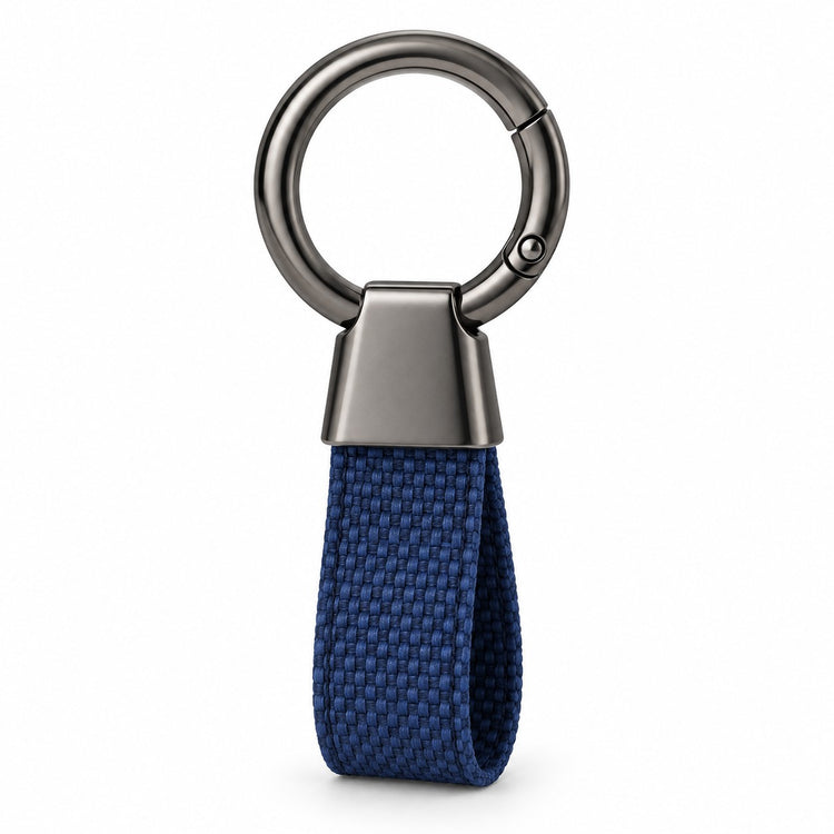 One blue Zinc Alloy Carabiner Keychain with a gunmetal ring, tapered housing, and fabric loop on white.