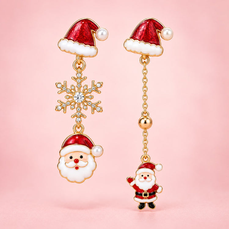 Santa hat earrings with snowflake and Santa charms on a soft festive blush backdrop.