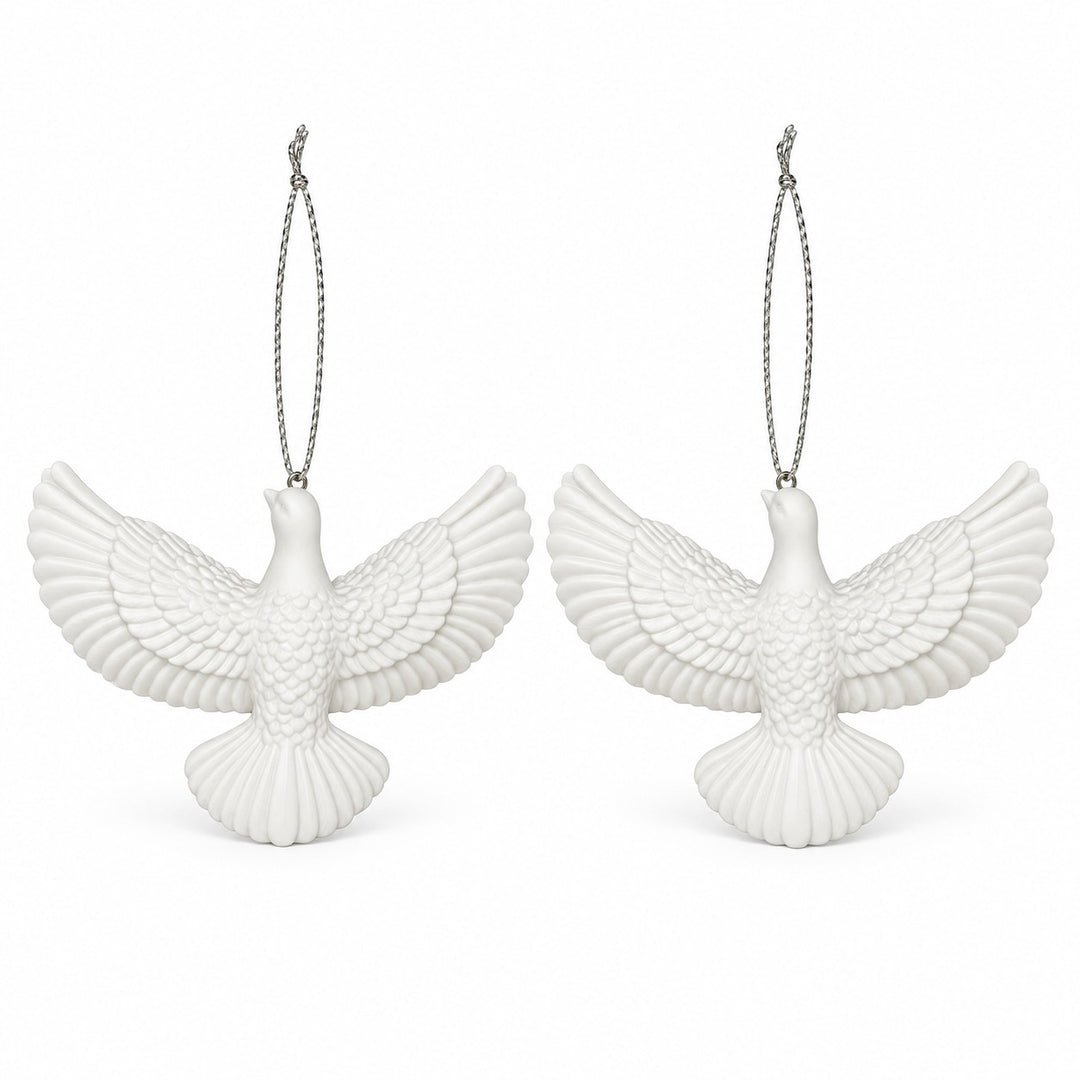 The set includes two white acrylic dove ornaments with silver hanging cords on a white background.