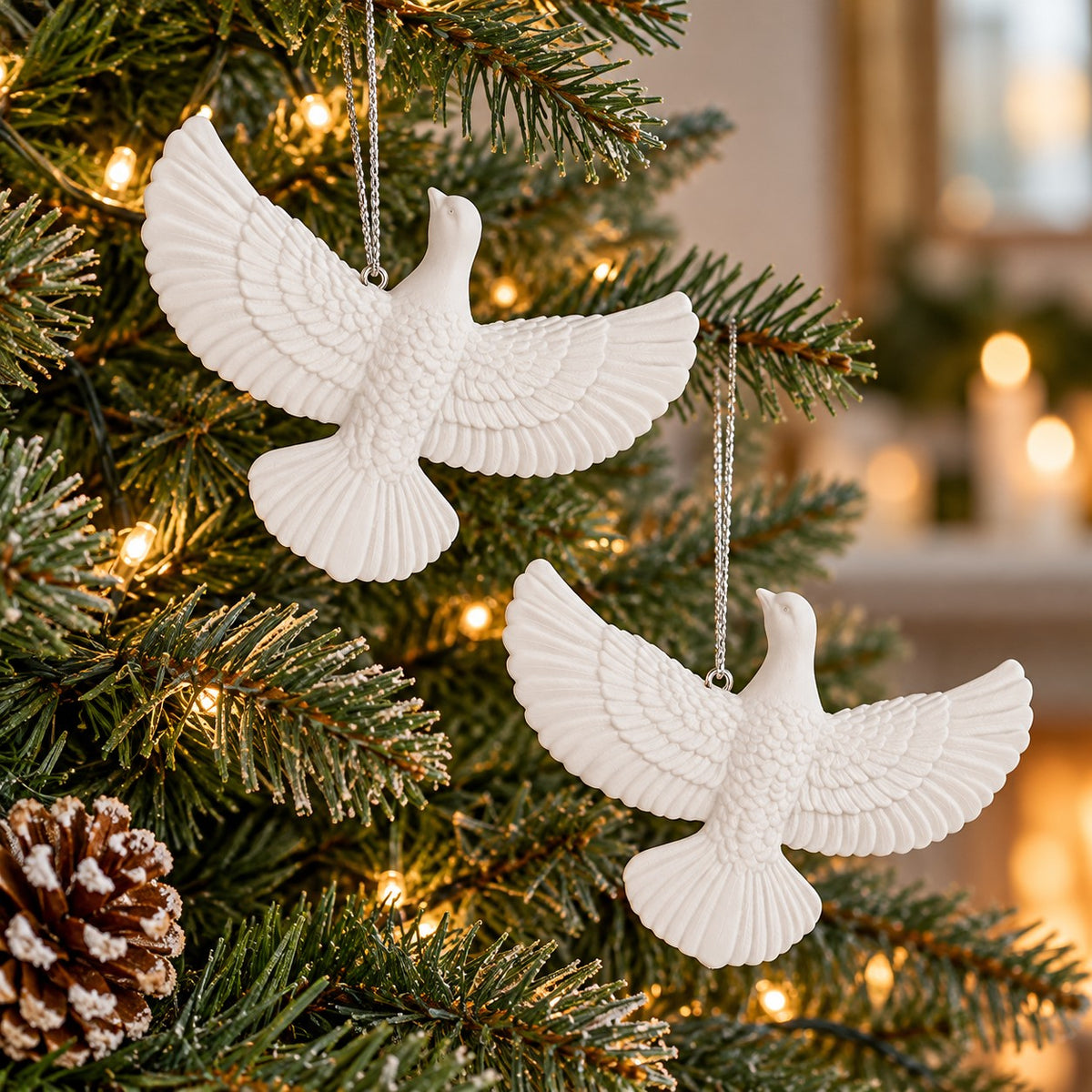White acrylic friendship dove ornaments add a peaceful finishing touch to an evergreen Christmas tree.