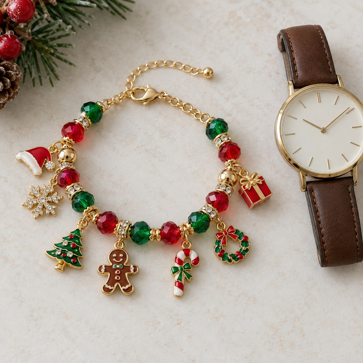 Adjustable Christmas charm bracelet beside an unmarked wristwatch to show its jewelry scale and extension chain.