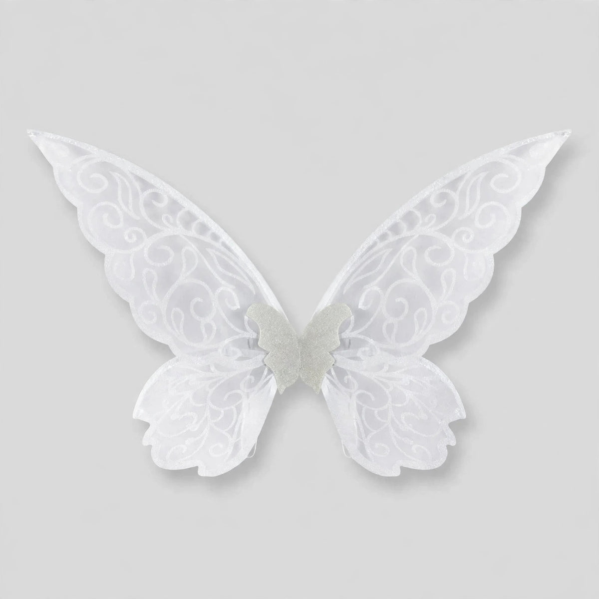 White fairy wings with swirling patterns, translucent panels, and scalloped edges spread against a light gray background.