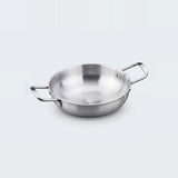 A silver stainless steel paella pan with two rectangular loop handles sits on a light gray background.