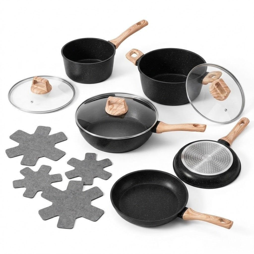 A 7-piece non-stick cookware set in black with light wood handles and lids, including a saucepan, two pots, a frying pan, a glass lid, and four gray star-shaped coasters, arranged on a white background.