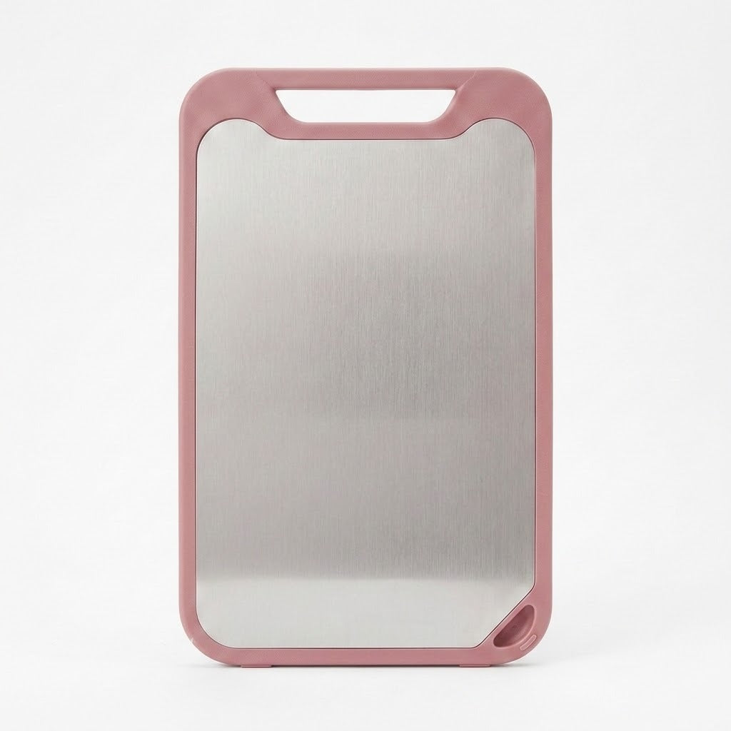 A rectangular magnetic cutting board with a brushed stainless steel center and a dusty rose pink frame, shown on a clean white background.