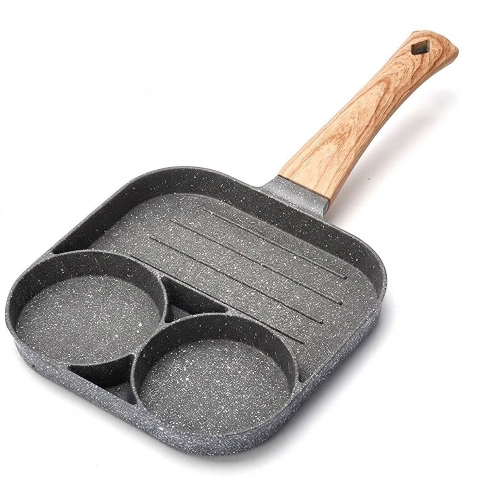 Gray speckled egg frying pan with two round wells, a ridged grill section, and a wood-grain handle against a white background.