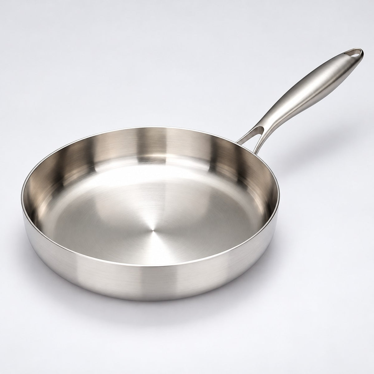 316 stainless steel frying pan, 30 cm size, centered on a light studio background with its handle visible.