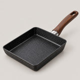 Japanese omelet pan only, with black speckled sides and a brown woodgrain-look handle.
