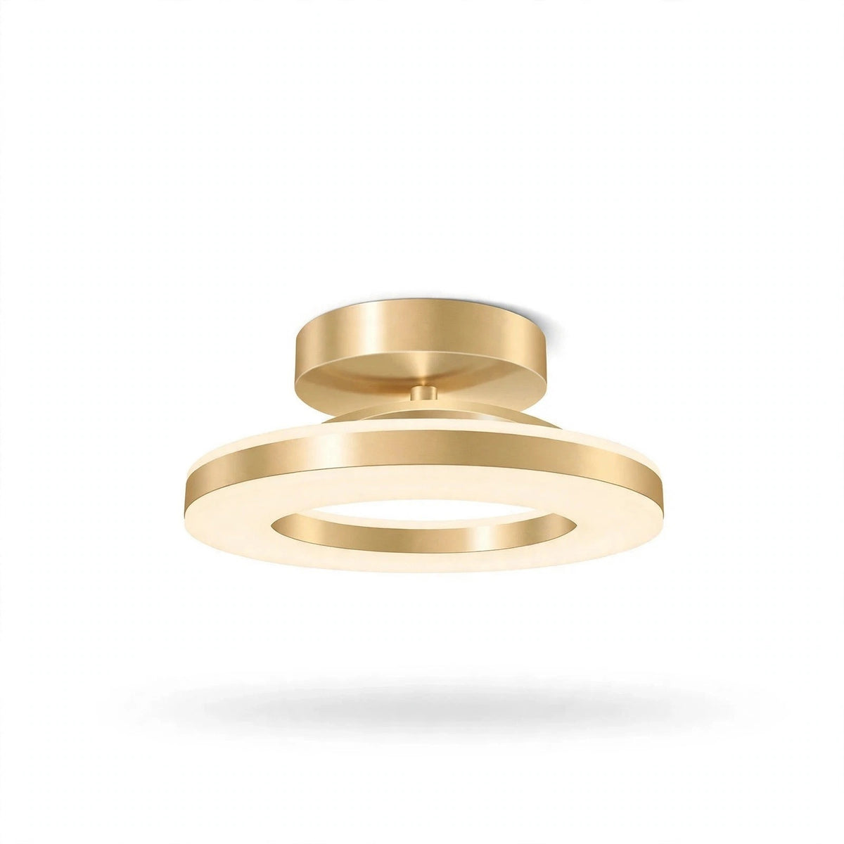 A modern semi-flush mount ceiling light fixture in a brushed gold finish, featuring concentric circular rings, shown against a plain white background with a soft shadow underneath.