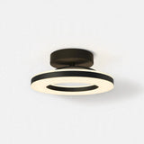 Modern semi-flush mount ceiling light with a matte black circular ceiling mount and a double-ring LED light fixture in black and warm white.