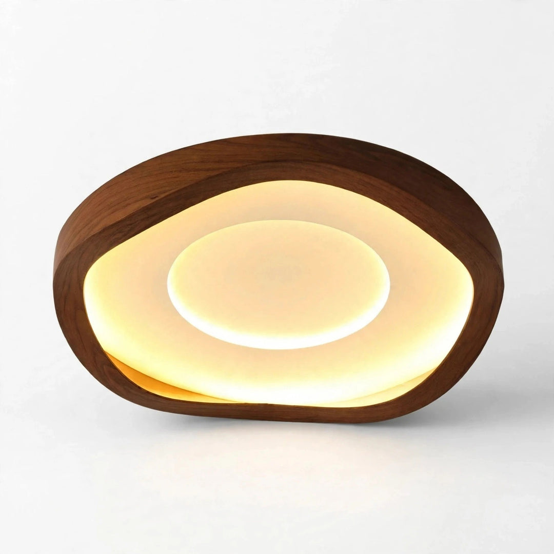 Ceiling light with a rounded triangular brown wood-grain frame and warm glowing circular center, shown against a white background.