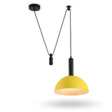 A modern pendant light fixture with a bright yellow dome shade and a matte black suspension system, shown against a plain white background.
