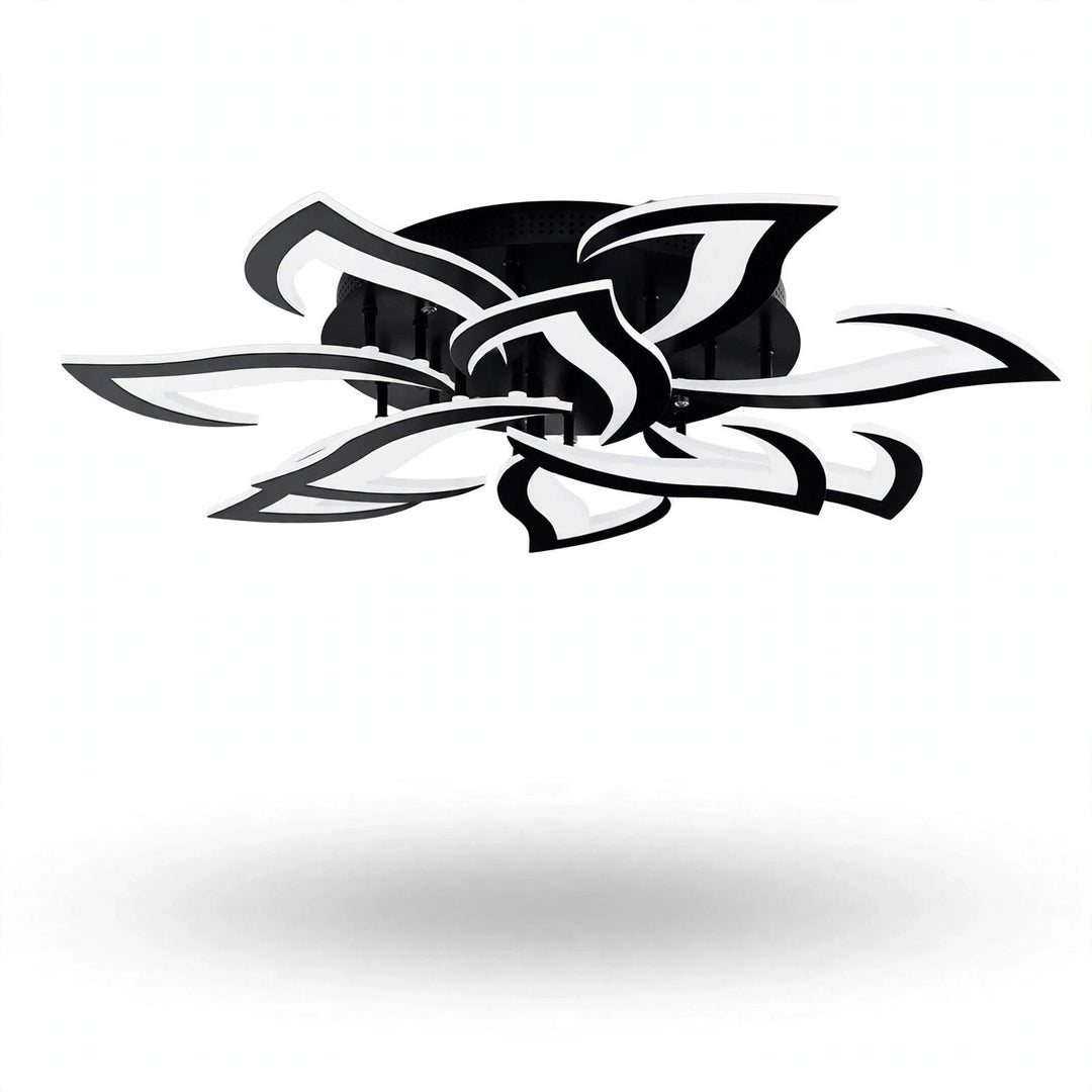 A black and white ceiling light is shown from a low angle, revealing layered petals and mounting rods against a white background.