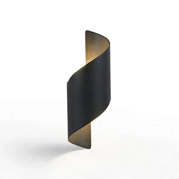 A modern spiral-shaped wall sconce with a matte black outer finish and a warm gold-toned inner lining, shown against a clean white background.