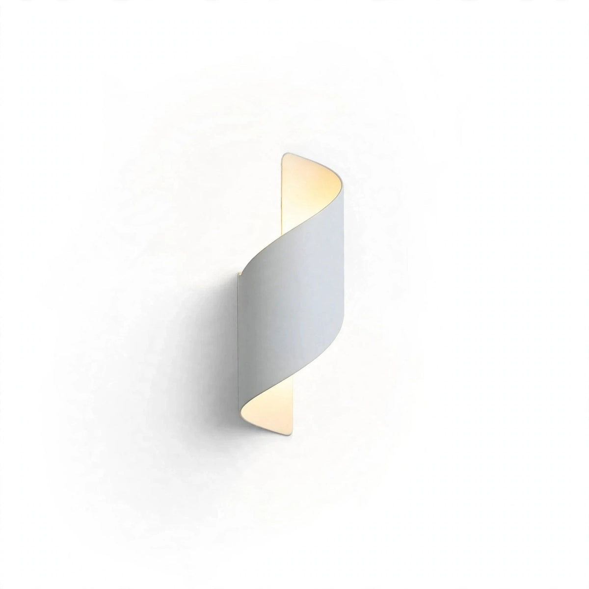 A modern spiral-shaped wall sconce with a matte light gray exterior and a warm yellow glow from the illuminated interior, shown against a plain white background.