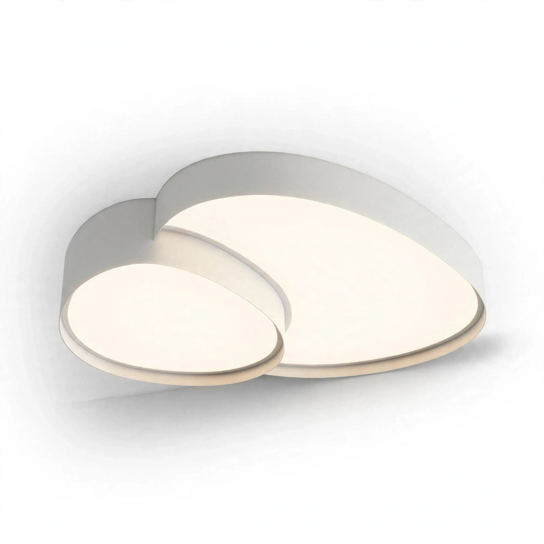 Silver-toned ceiling light with two overlapping rounded acrylic panels glowing warmly against a white background.