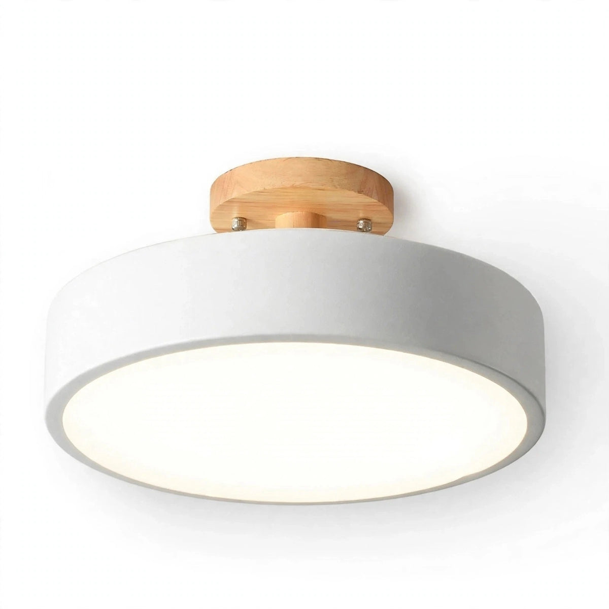 A modern semi-flush mount ceiling light with a matte white cylindrical shade, a natural light wood ceiling mount, and a glowing white frosted glass diffuser, shown against a plain white background.