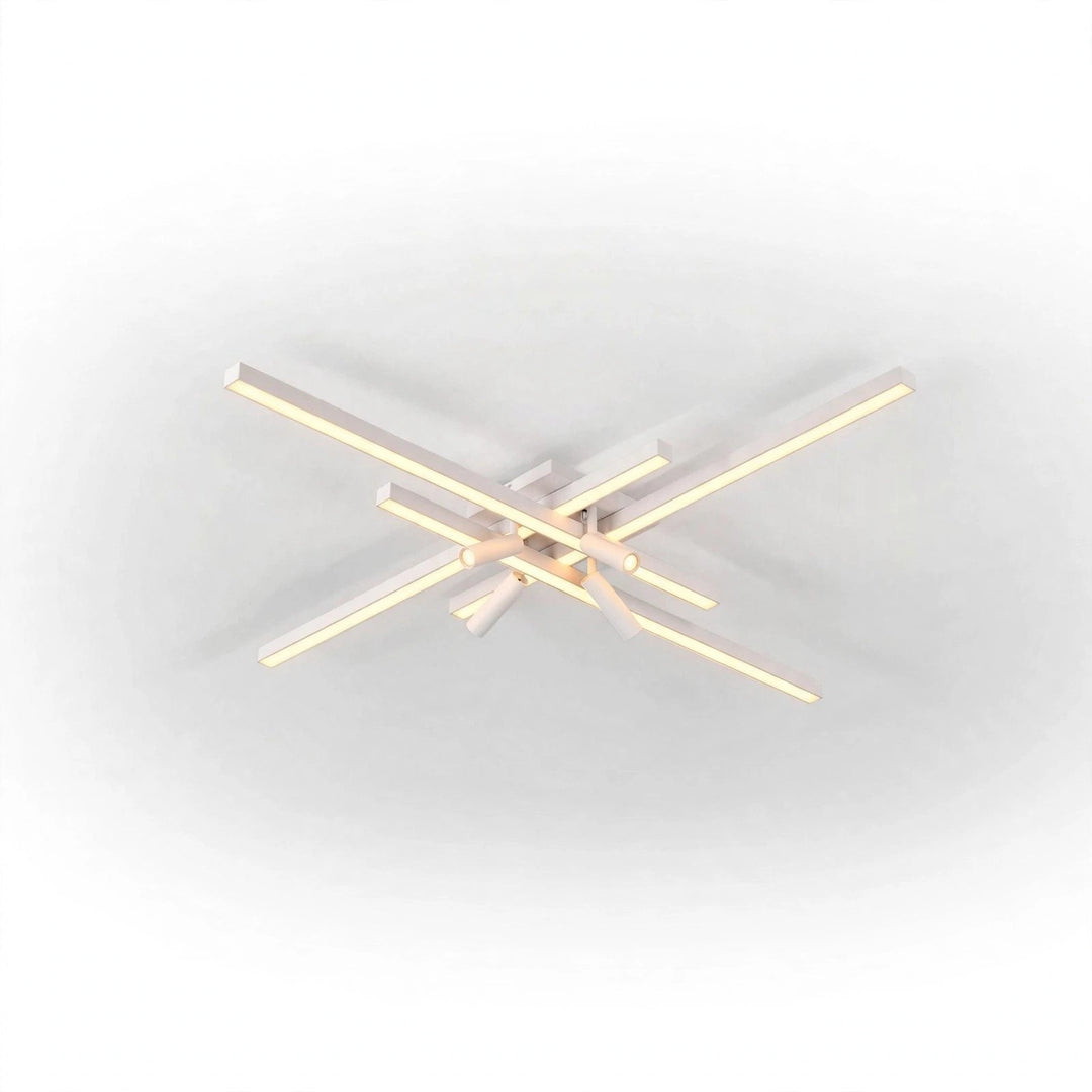 White ceiling light with intersecting straight bars glowing pale yellow against a white background.