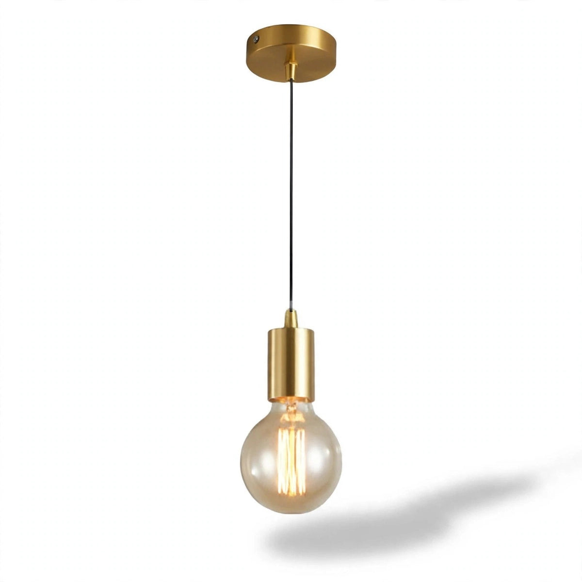 A modern industrial-style pendant light with a brushed gold ceiling canopy, a black cord, and a gold-finished socket holding a clear glass globe bulb with an illuminated filament, shown against a white background with a soft shadow.