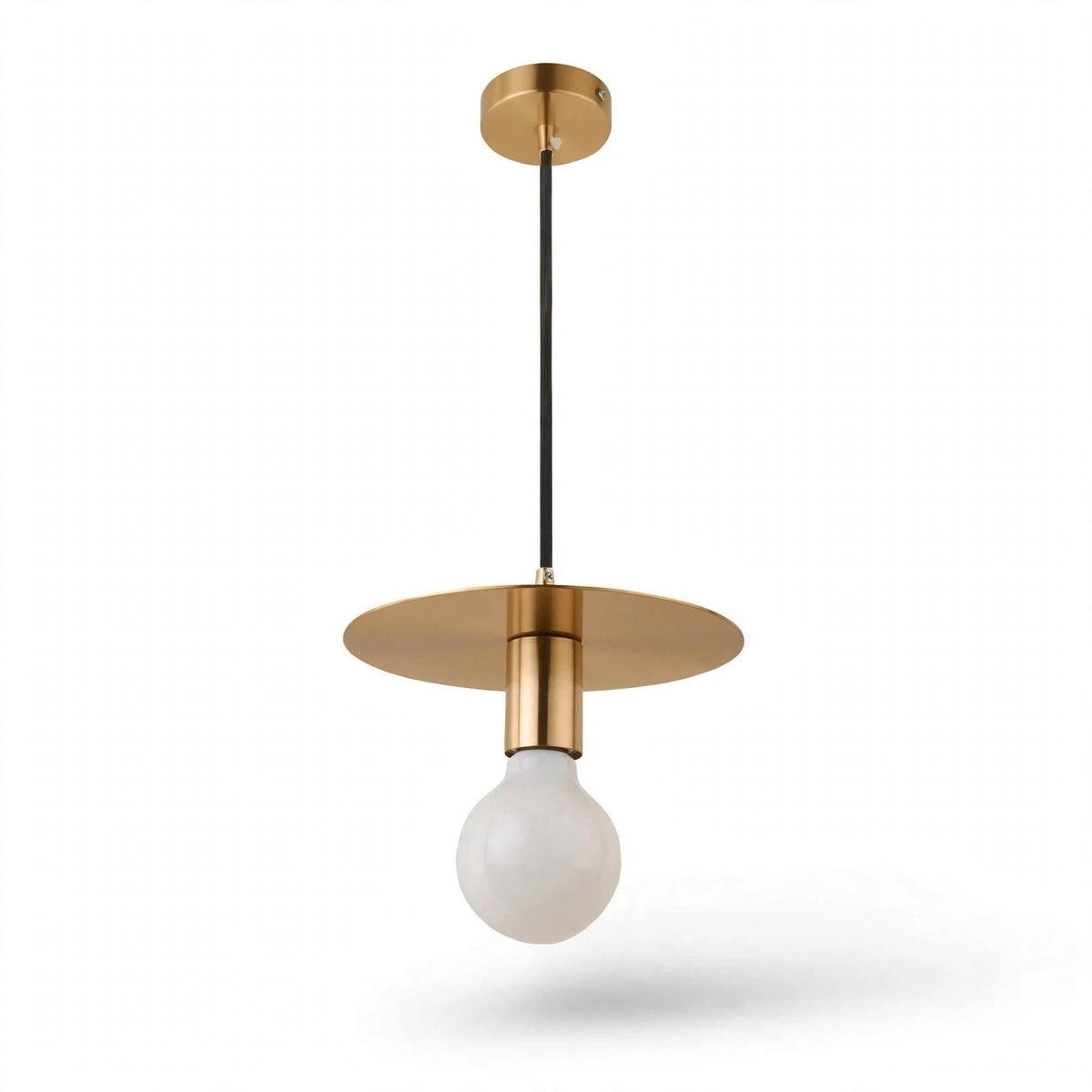 A modern pendant light fixture with a brushed brass/gold ceiling canopy and circular shade, suspended by a black cord from an Edison-style glass bulb, shown against a plain white background.