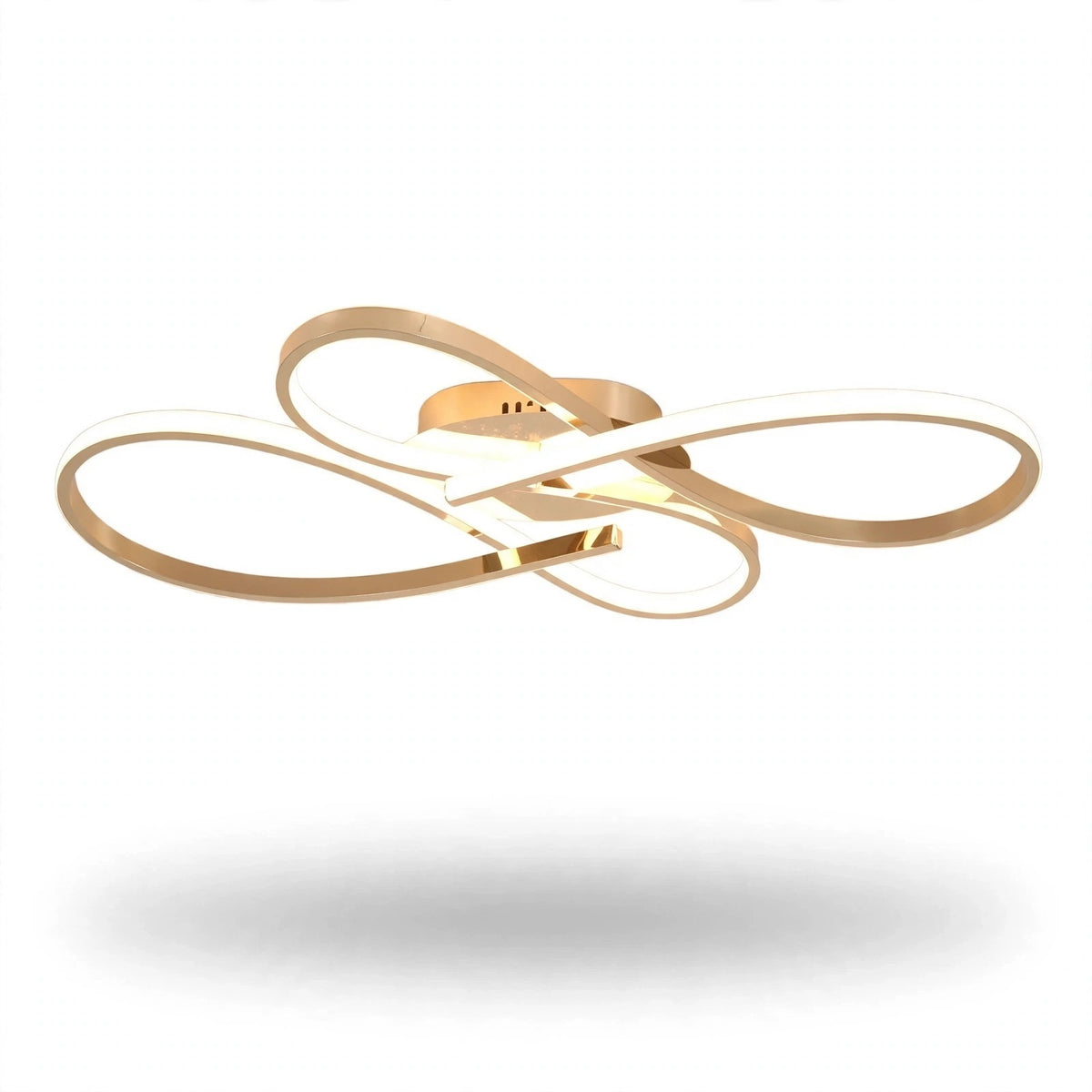A modern ceiling light fixture with interlocking oval rings in a brushed gold finish, featuring a central square plate and a warm white illuminated diffuser, shown against a plain white background with a soft shadow below.