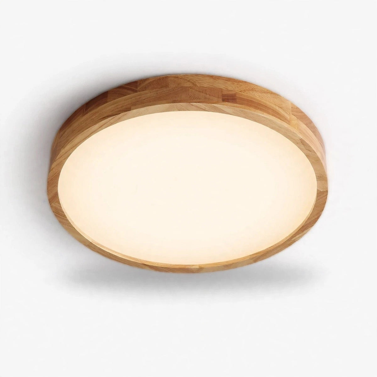 A round flush-mount ceiling light with a natural wood frame and a warm white frosted glass diffuser, shown against a plain white background.