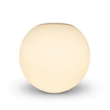 White glass globe wall sconce appears warm cream, with a narrow gray top rim against a white background.