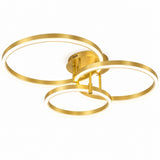 Modern ceiling light fixture with three interlocking gold-toned circular rings and a glowing white LED light, shown against a plain white background.
