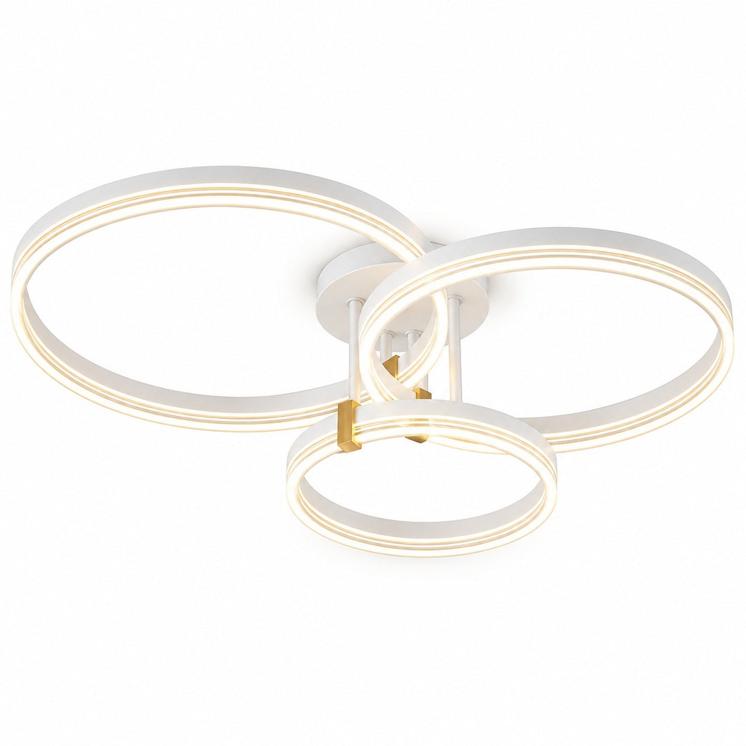 A modern three-ring LED ceiling light fixture in white with a small gold accent, shown against a solid white background.