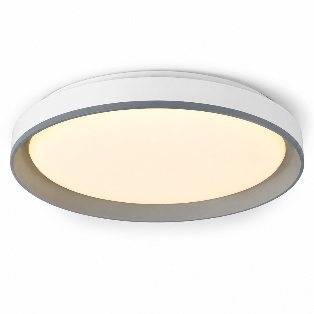 A modern flush-mount circular ceiling light with a white outer frame and a warm yellow illuminated diffuser, shown against a plain white background.