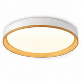 A modern round ceiling light fixture with a white outer frame, a warm wood-grain inner trim, and a glowing white diffuser, shown against a plain white background.