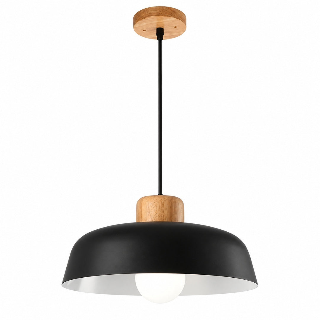 A modern pendant light fixture with a matte black dome shade, a natural wood ceiling canopy and middle accent, and a white interior lining, shown against a plain white background.