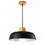 A modern pendant light fixture with a matte black dome shade, a natural wood ceiling canopy and middle accent, and a white interior lining, shown against a plain white background.