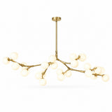 Wide gold-tone chandelier with tiered branching arms, glowing white globe shades, and a straight suspension rod against a white background.