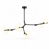 Black chandelier with angular branching arms, glowing white globe shades, and a round ceiling canopy against a white background.