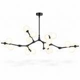 Black chandelier with widely spread jointed arms and clusters of glowing white globe shades against a plain white background.